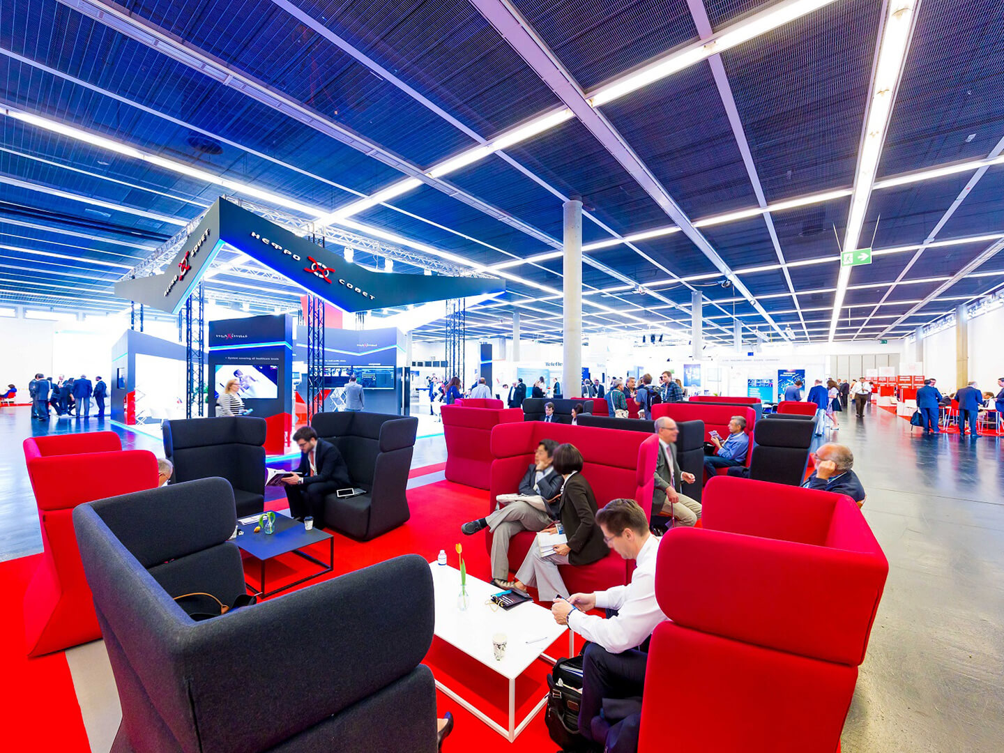 Photo: Event concept trade fair visitor WiFi furniture and hall
