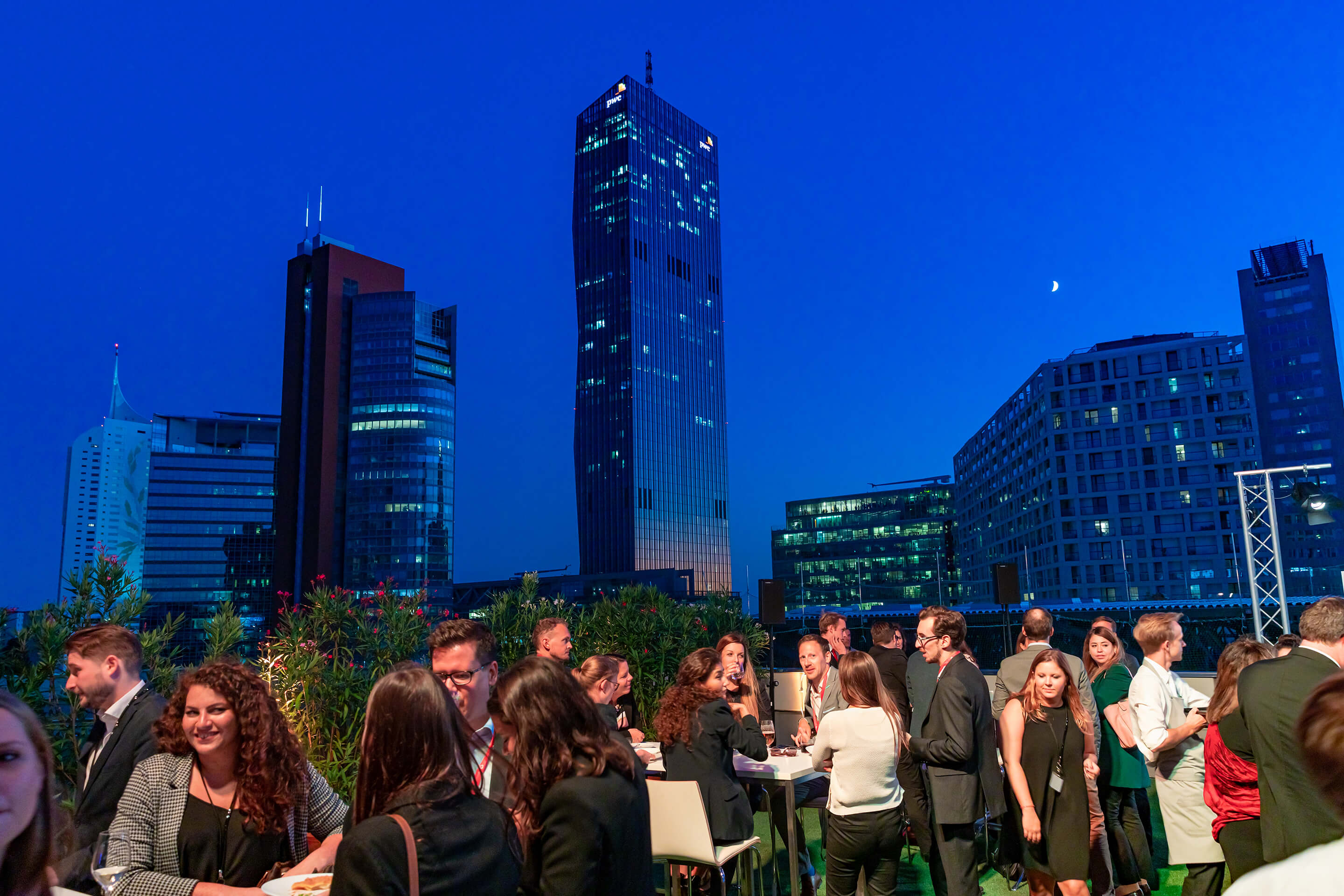 Photo: Event concepts outdoor rooftop with the Donau City skyline in the background