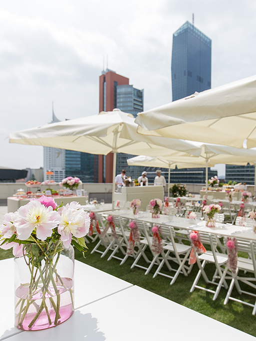 Photo: Main building Level 3 Rooftop Terrace Motto Catering seating