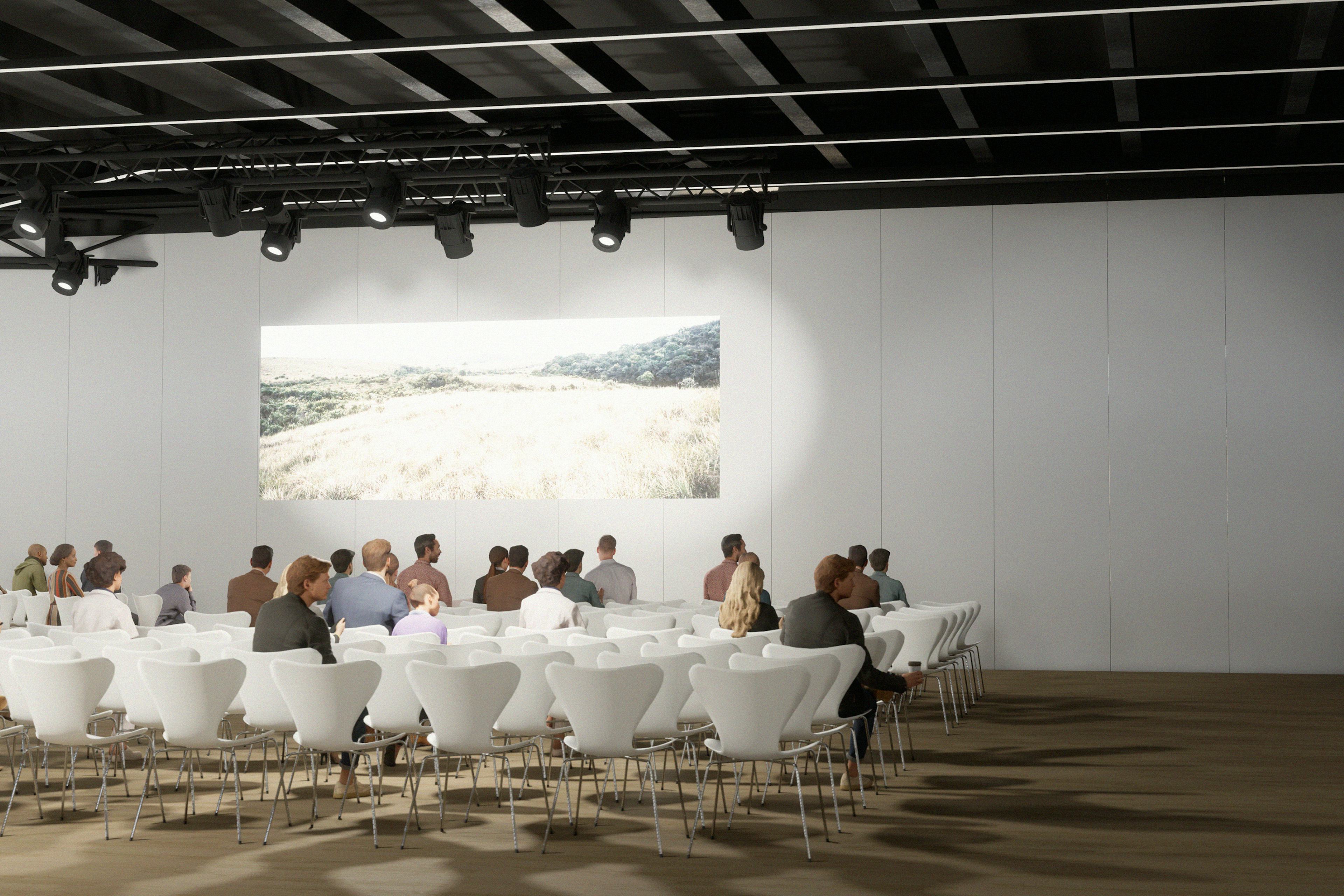 Mockup: einige Menschen sitzen auf weissen Stuehlen in einem Raum mit einer Leinwand